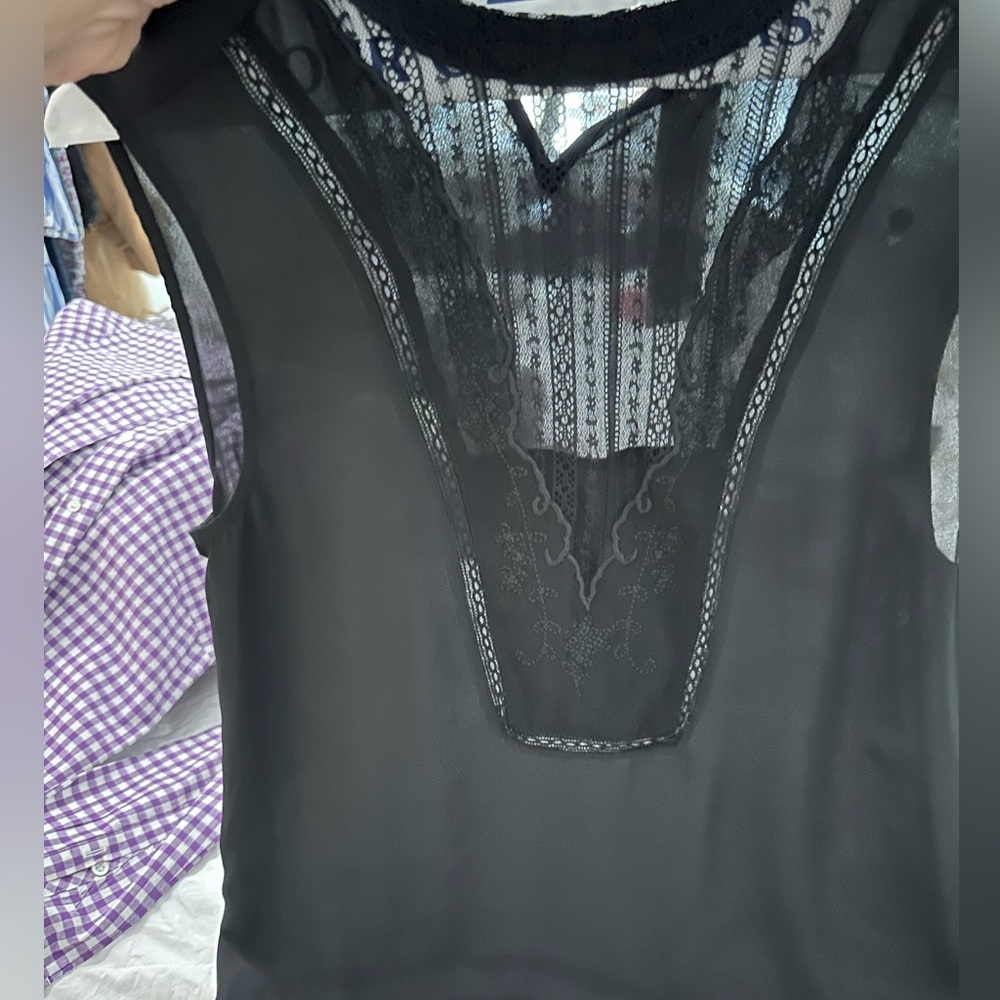 Black blouse with fun detail
